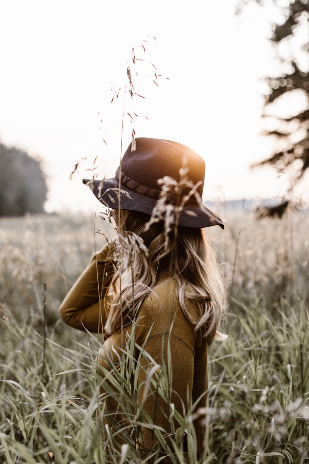 rewild nature woman with hat